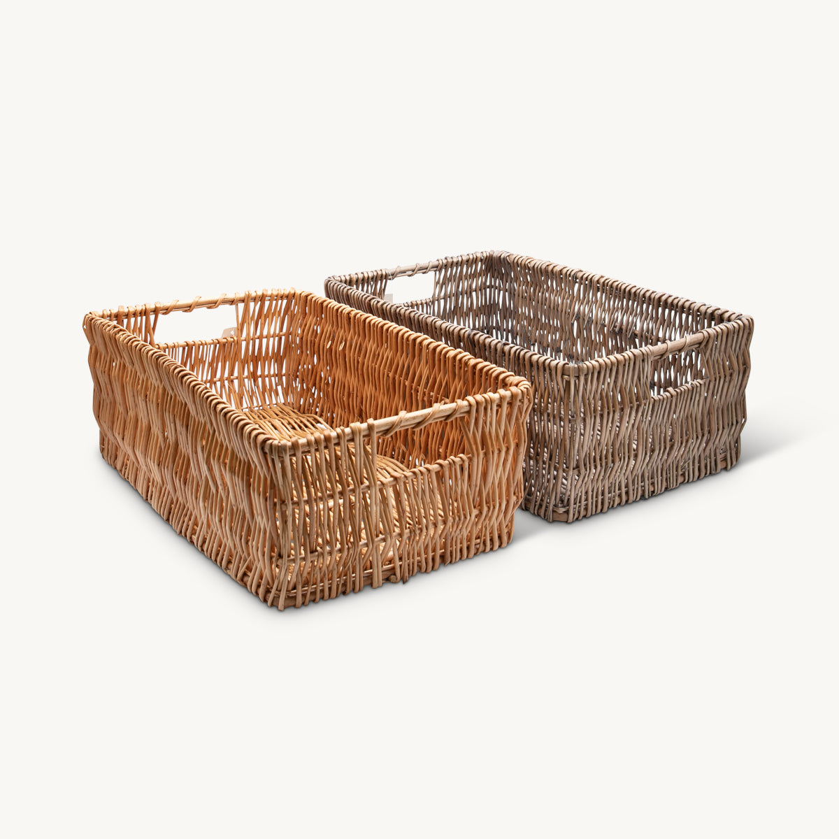 Medium deep wicker tray with handles with structured, low-profile walls and open-top design.