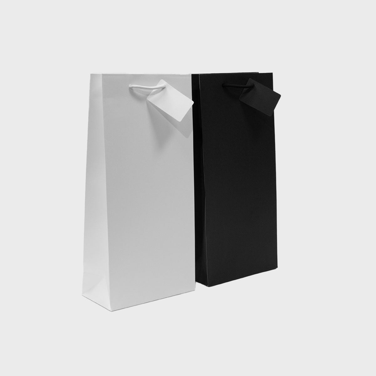 2 Bottle paper gift bag featuring a patterned finish and heavy-duty handles.