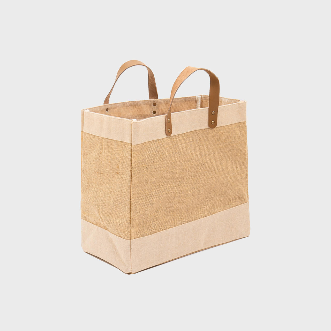 Medium natural jute market bag with leather handles.