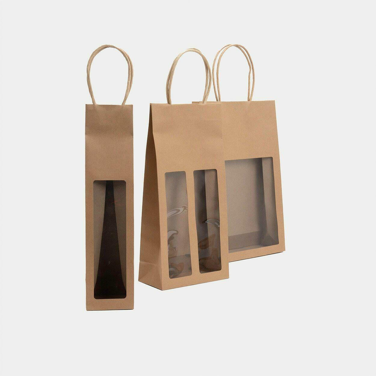 Kraft bottle gift bag with window featuring a patterned finish and heavy-duty handles.