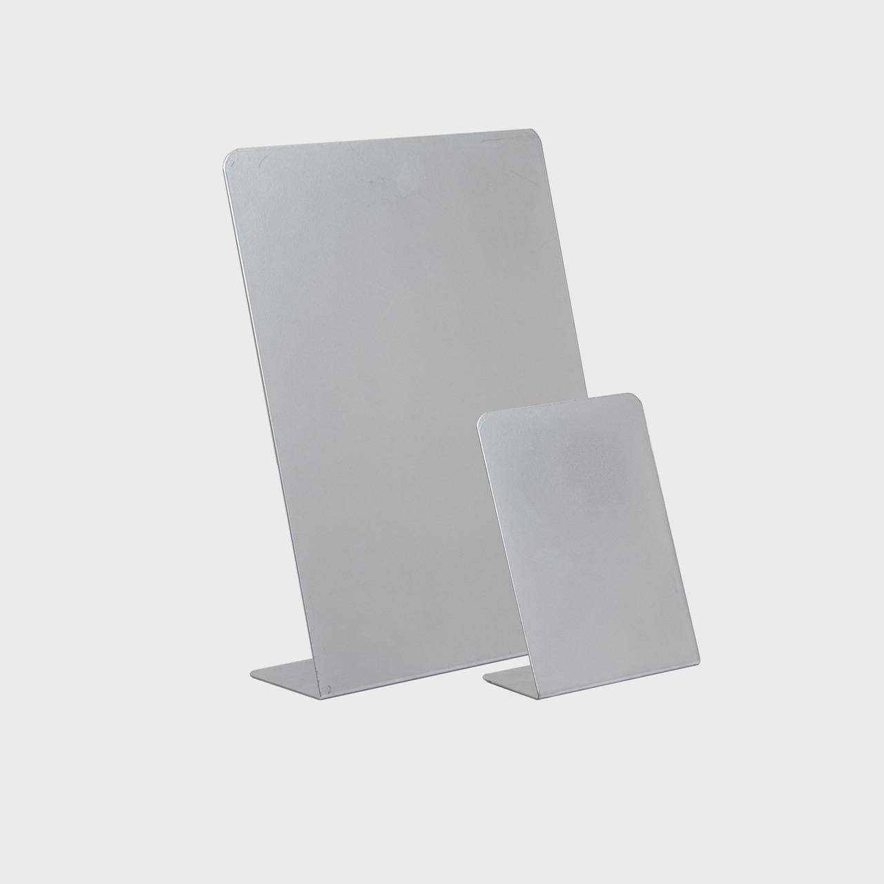 L shaped grey display easel.
