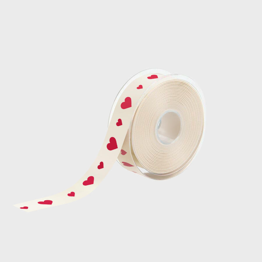25mm cotton ribbon - red hearts with a high-quality finish used as a decorative accent.