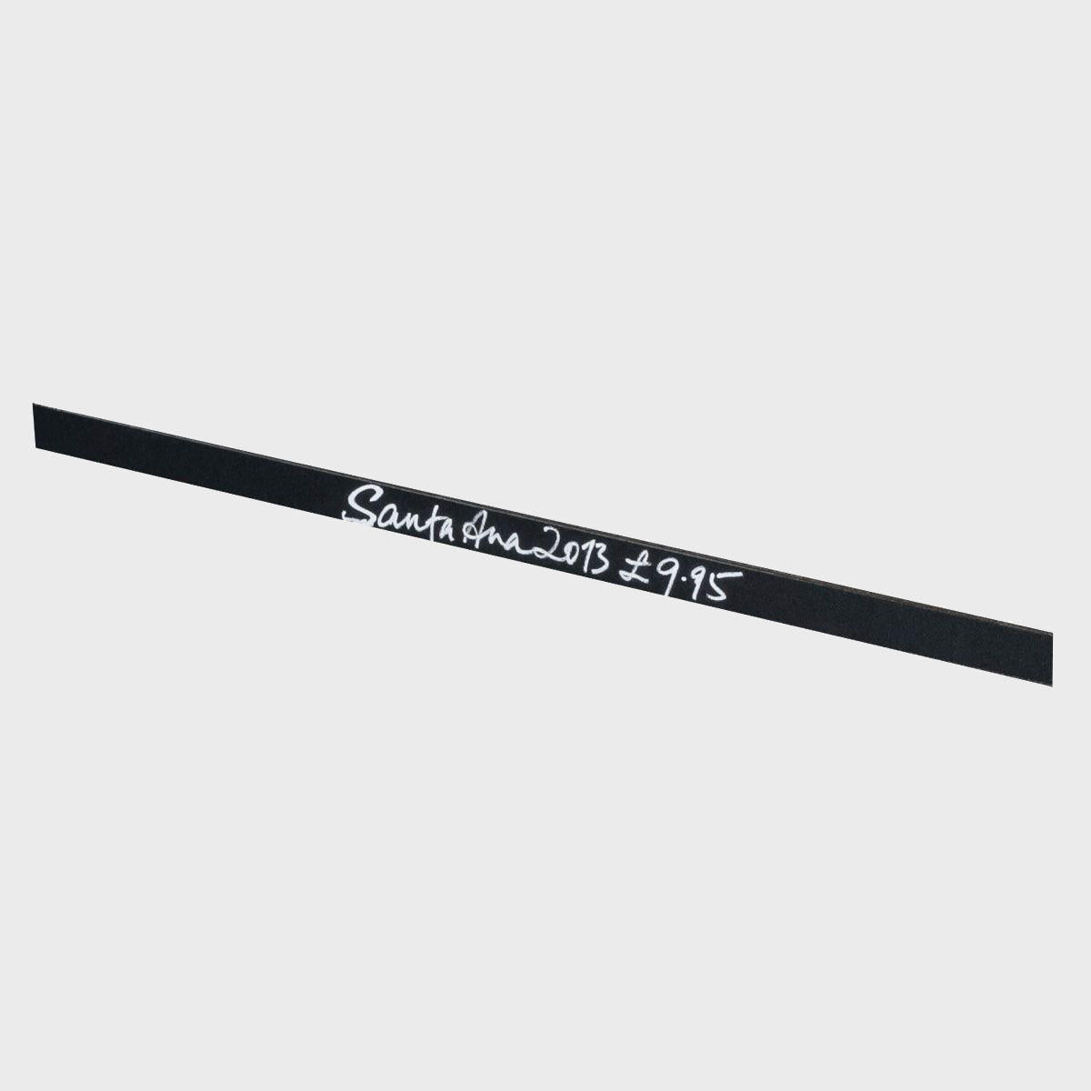 Magnetic chalkboard signage strip with a clean surface for visible retail messaging.