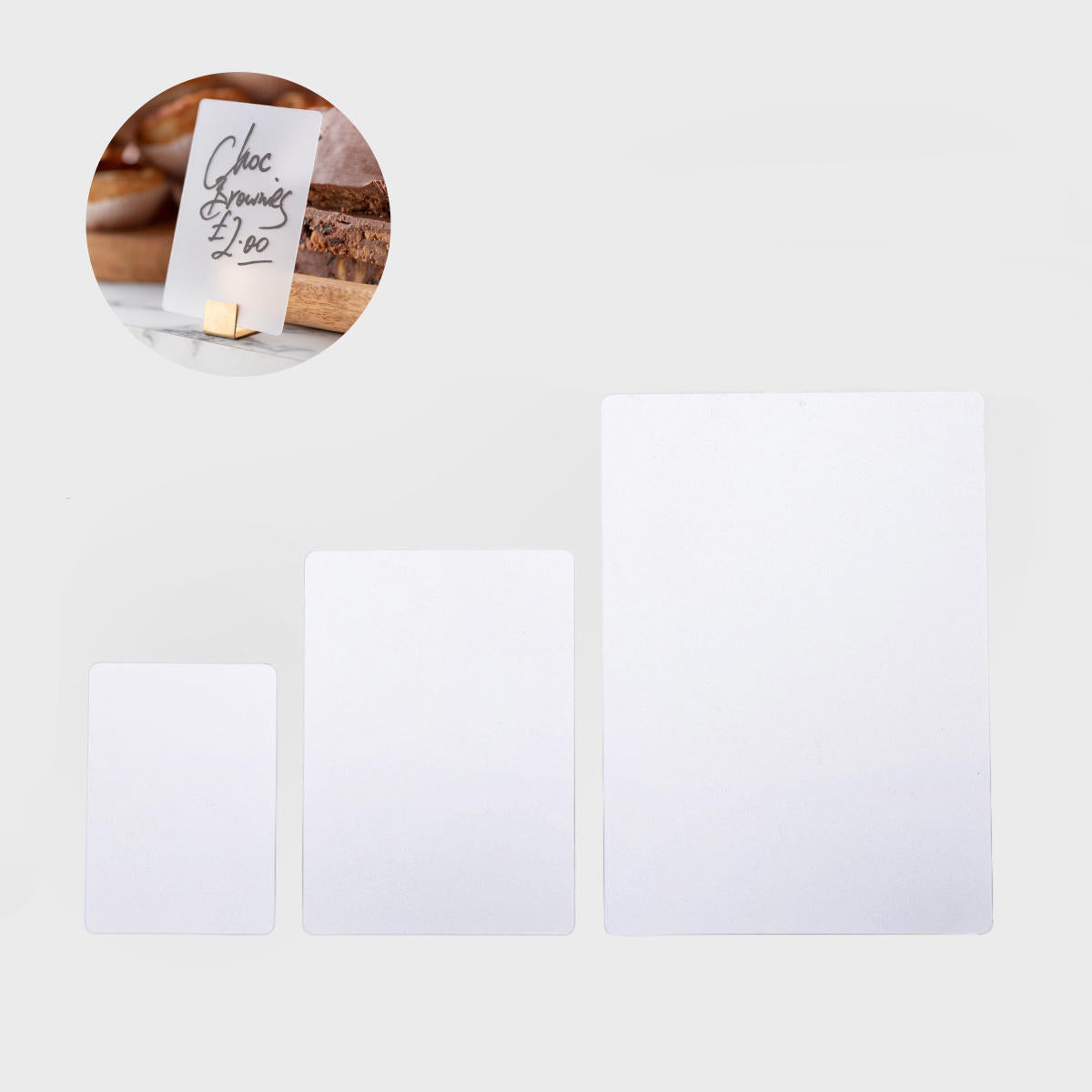 Reversible frosted signage tags with a clean surface for visible retail messaging.