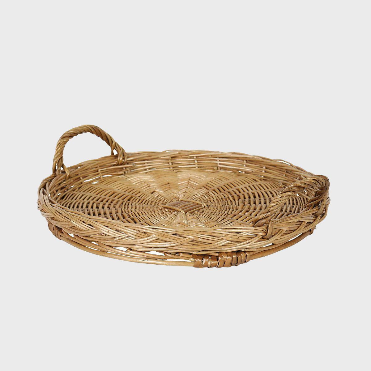 Rutland medium round wicker tray with handles with structured, low-profile walls and open-top design.