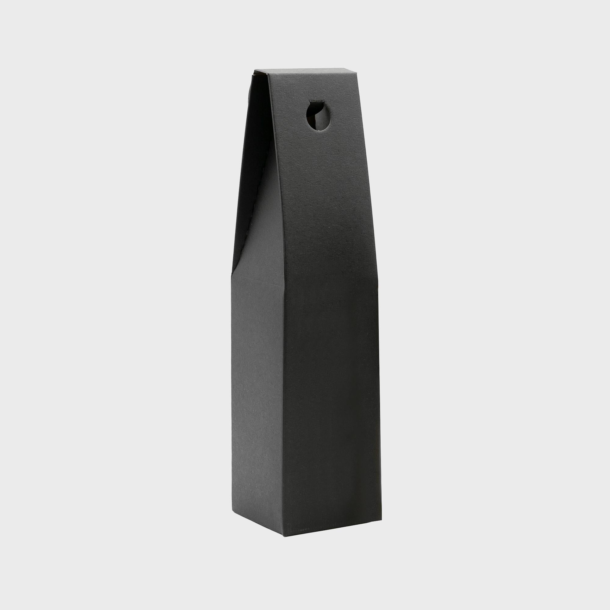 1 Bottle gift box from high-density rigid paperboard in black.