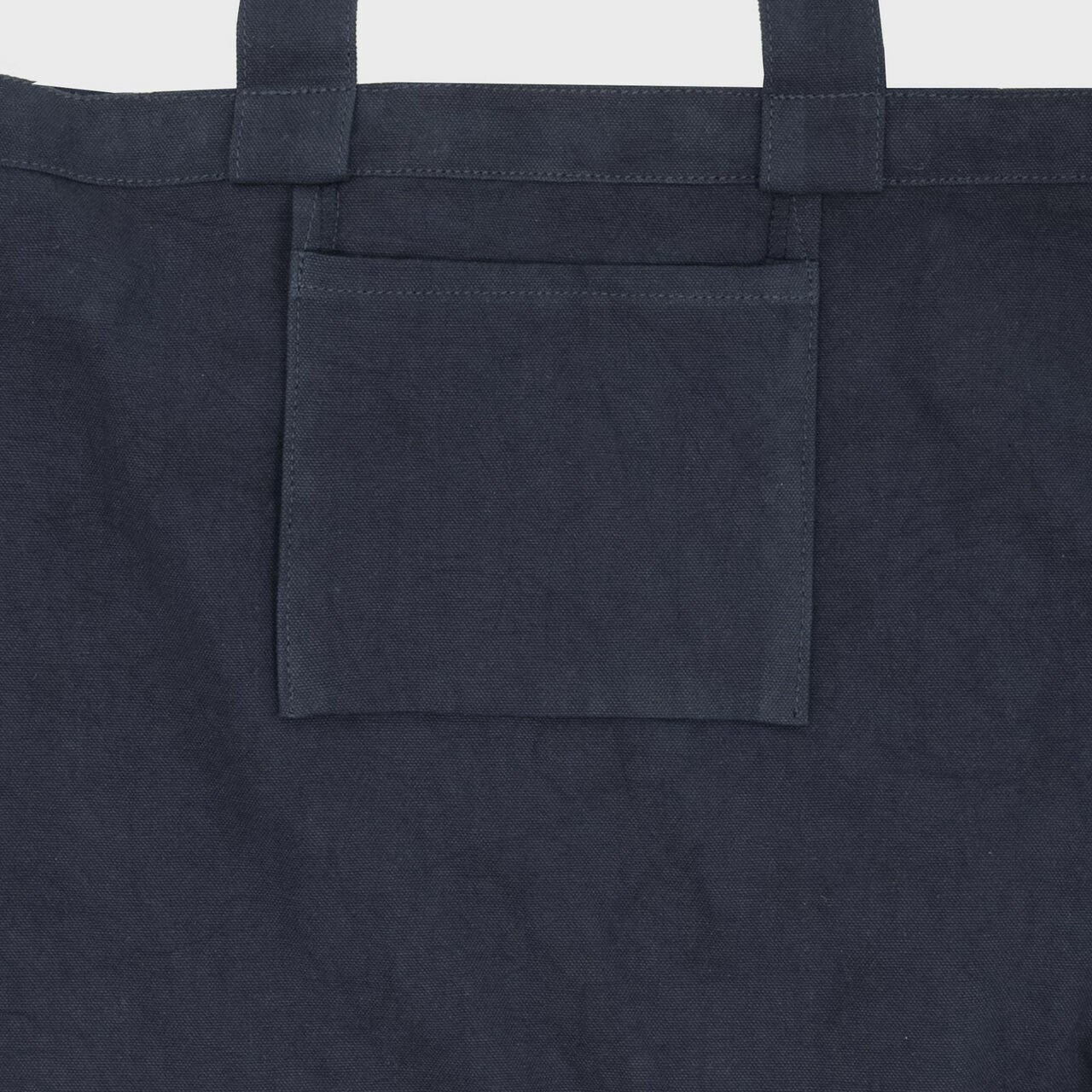 Navy 8oz recycled canvas bag with gusset and pocket.