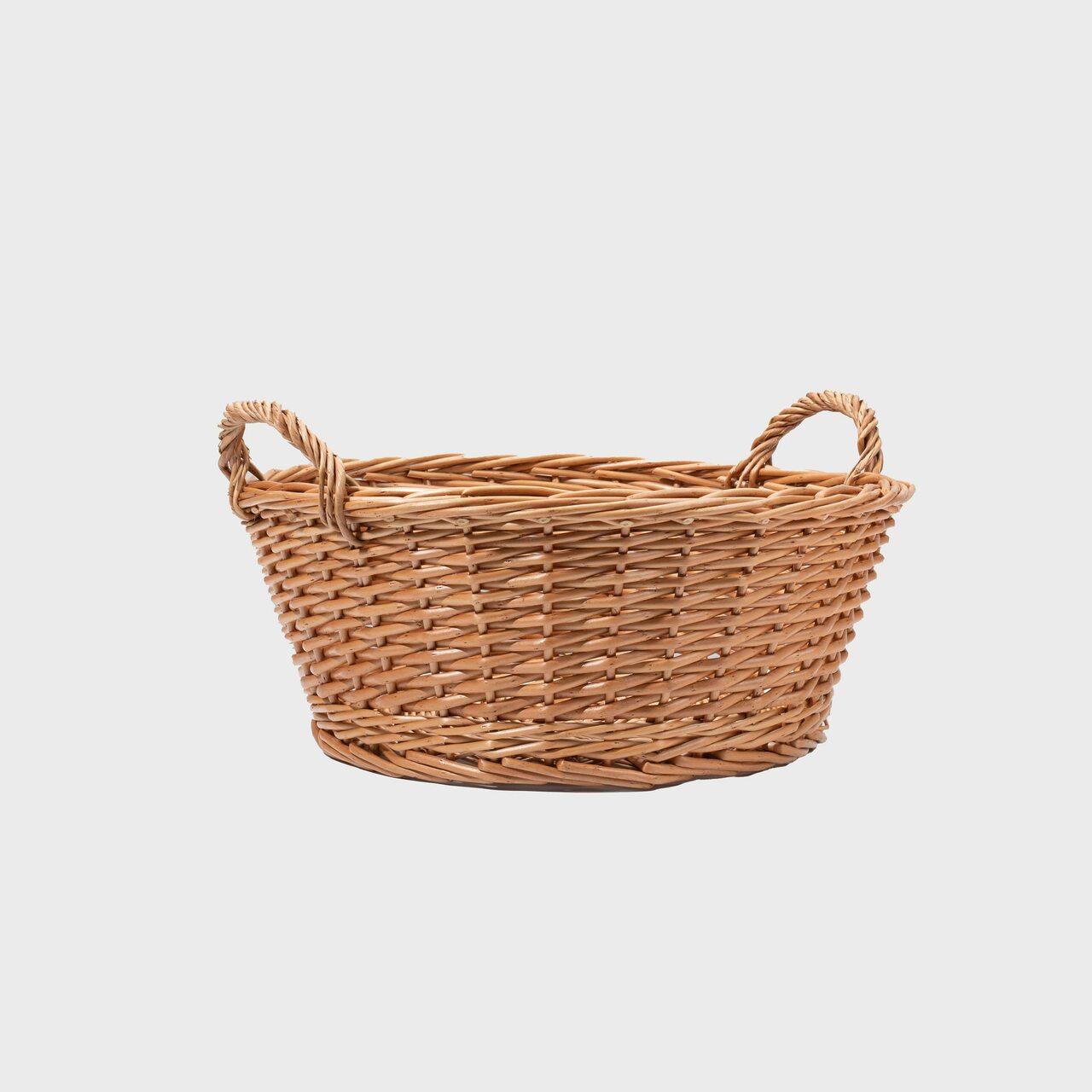 Medium wicker basket hand-woven from natural split-wicker.
