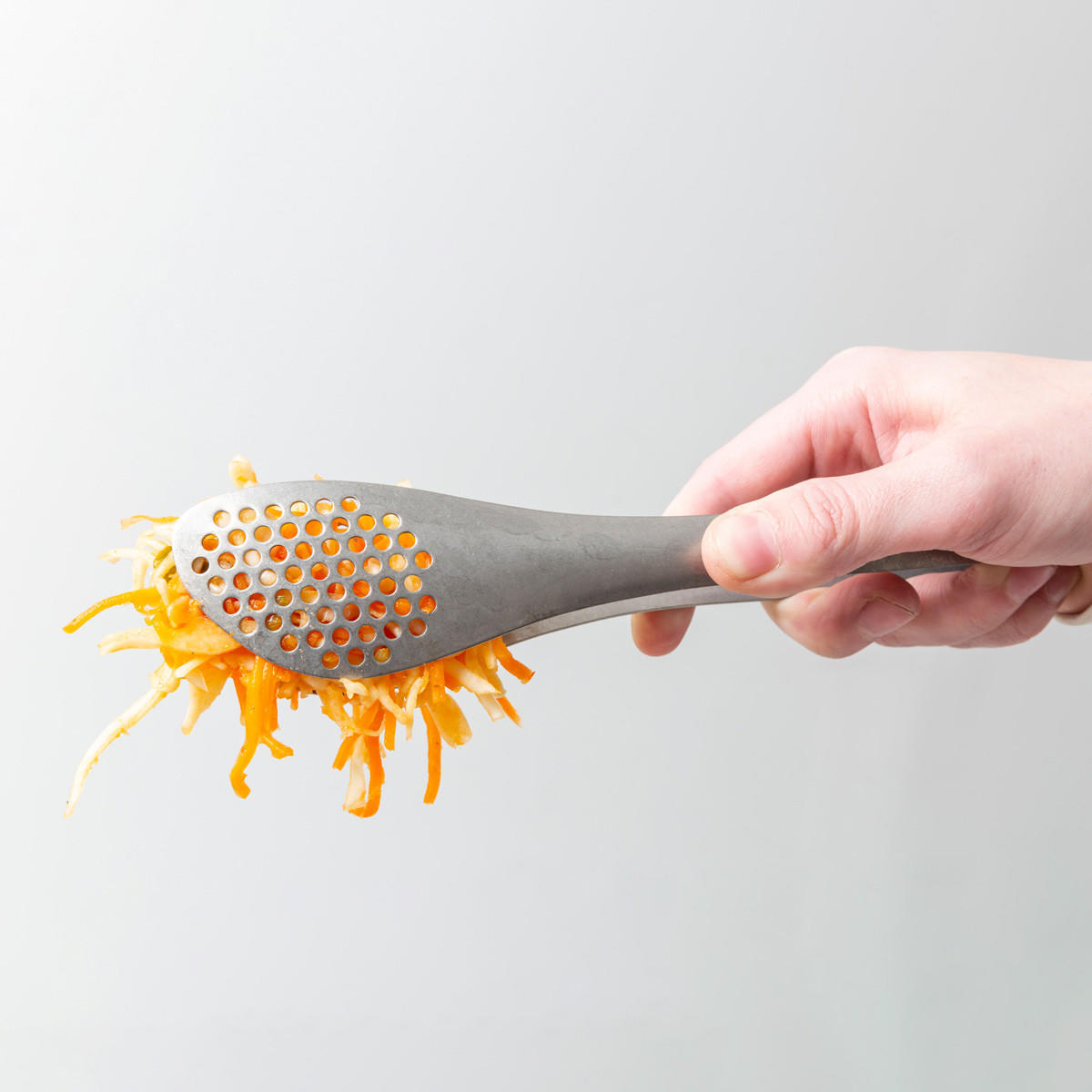 Vintage silver perforated tongs.