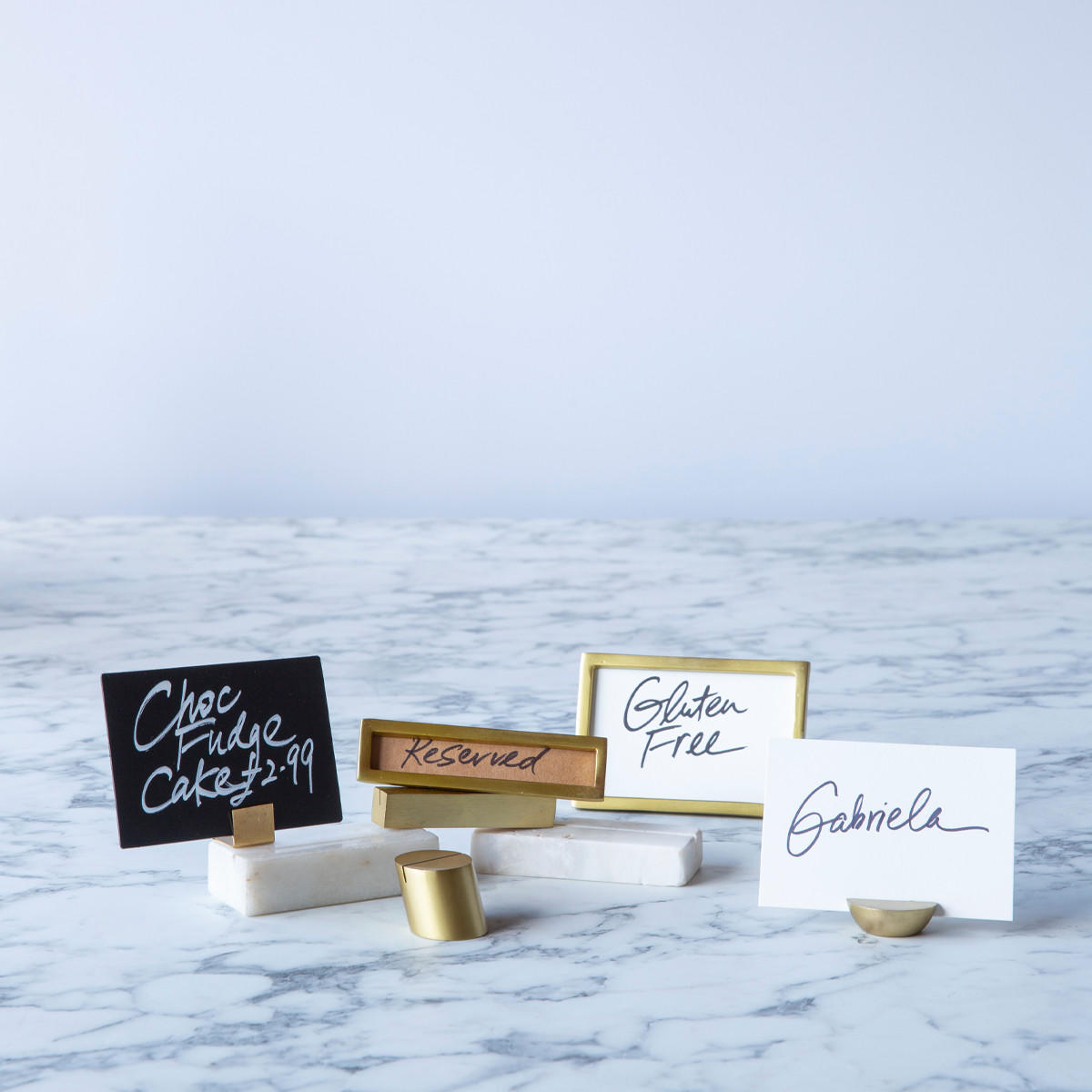 Whiteboard signage tags with a clean surface for visible retail messaging.