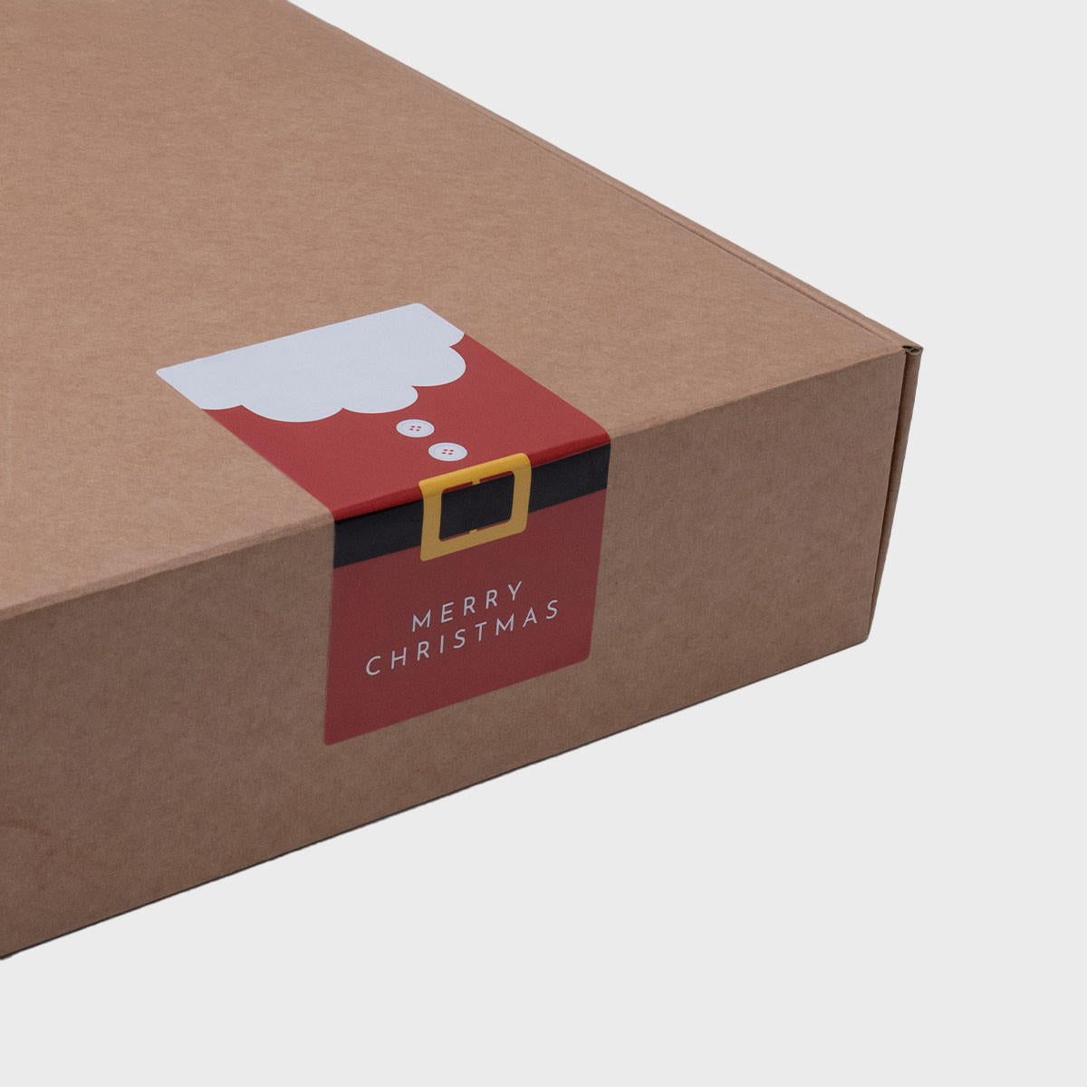 Oversized santa's belt christmas paper sticker (100 p/roll) with a high-quality finish used as a decorative accent.
