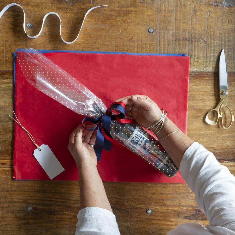 Cellopak minidot white gift wrap.