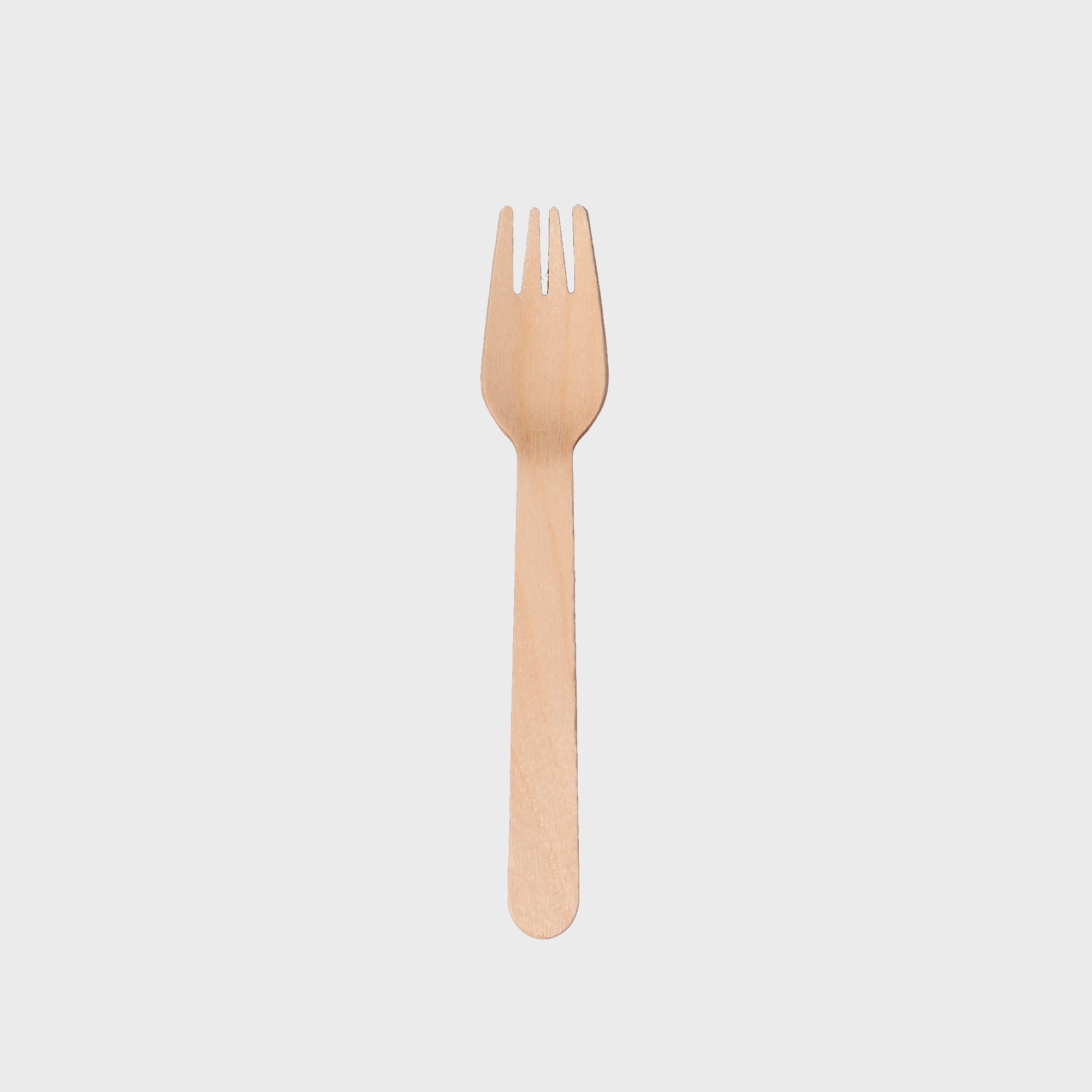 Disposable wooden cutlery, including a fork.