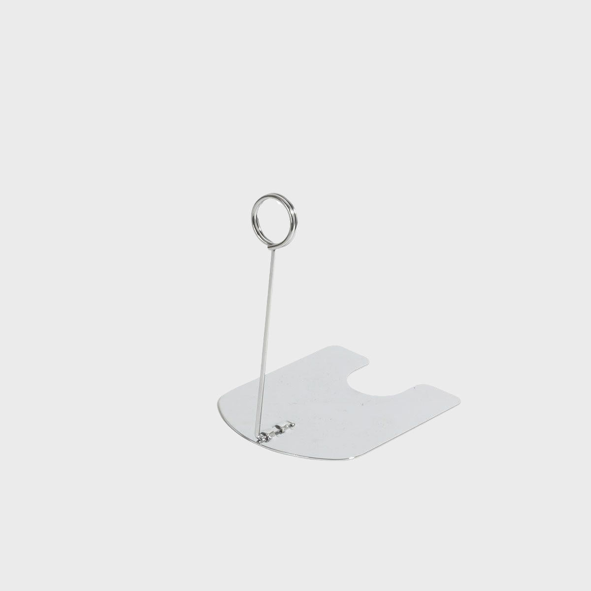 Chrome ticket holders with a simple design, featuring a flat base and a vertical circular holder at the top for tickets or tags.