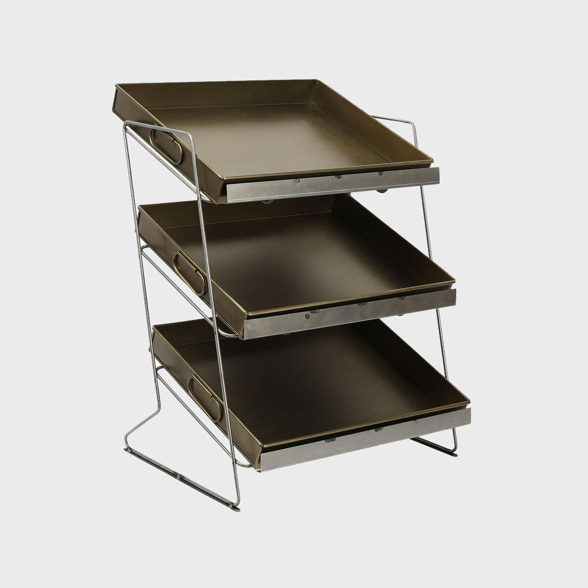 A set of three-tiered countertop display units with medium brass metal trays.