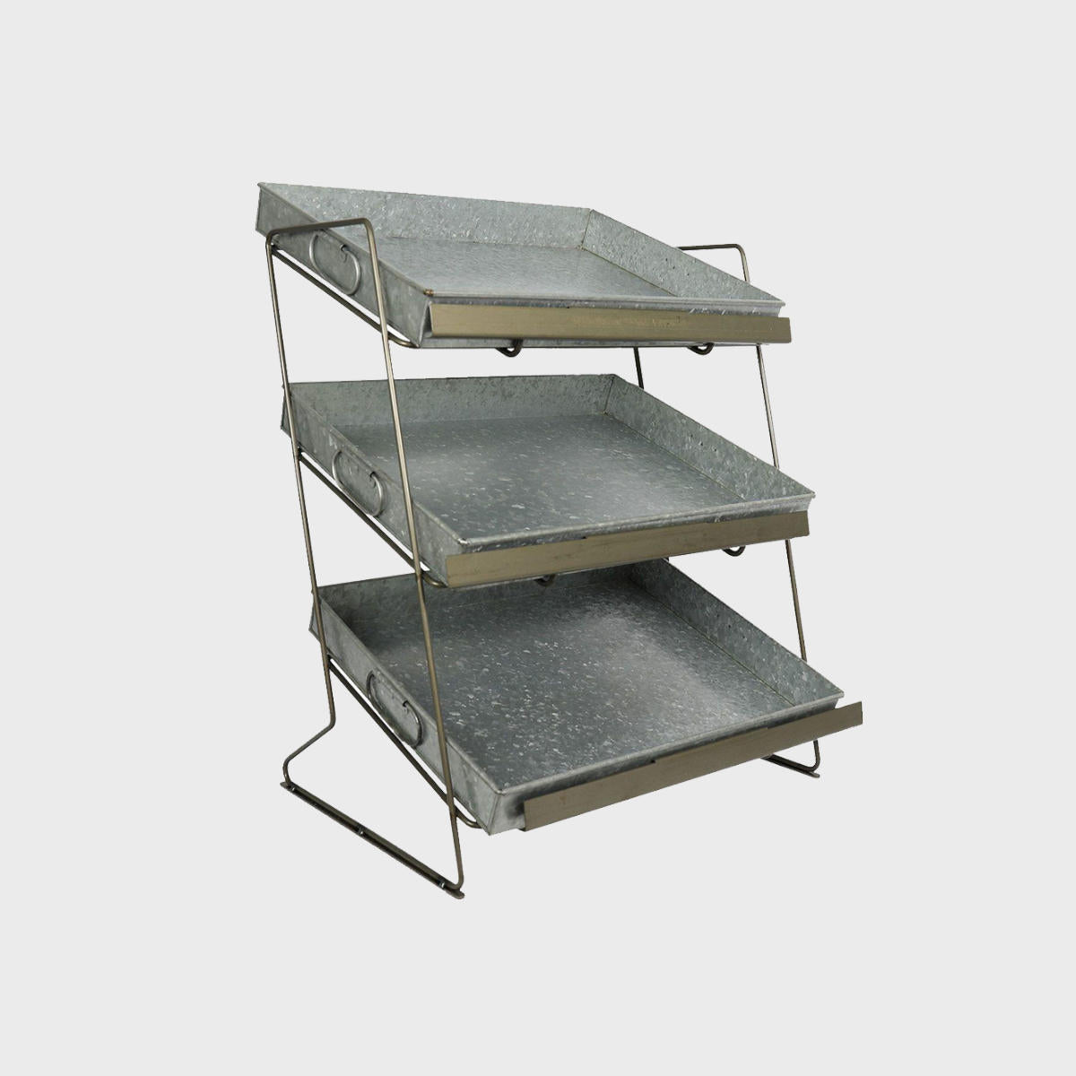 A silver tiered countertop display unit with medium-sized metal trays.