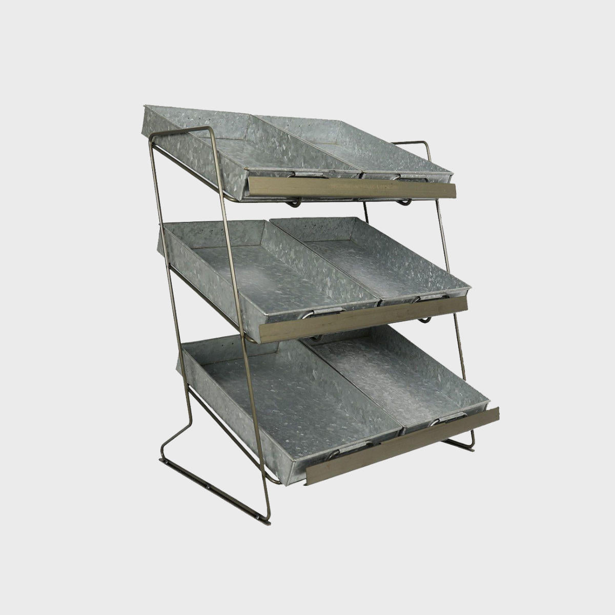 A silver, tiered countertop display unit with small metal trays made from galvanised steel.