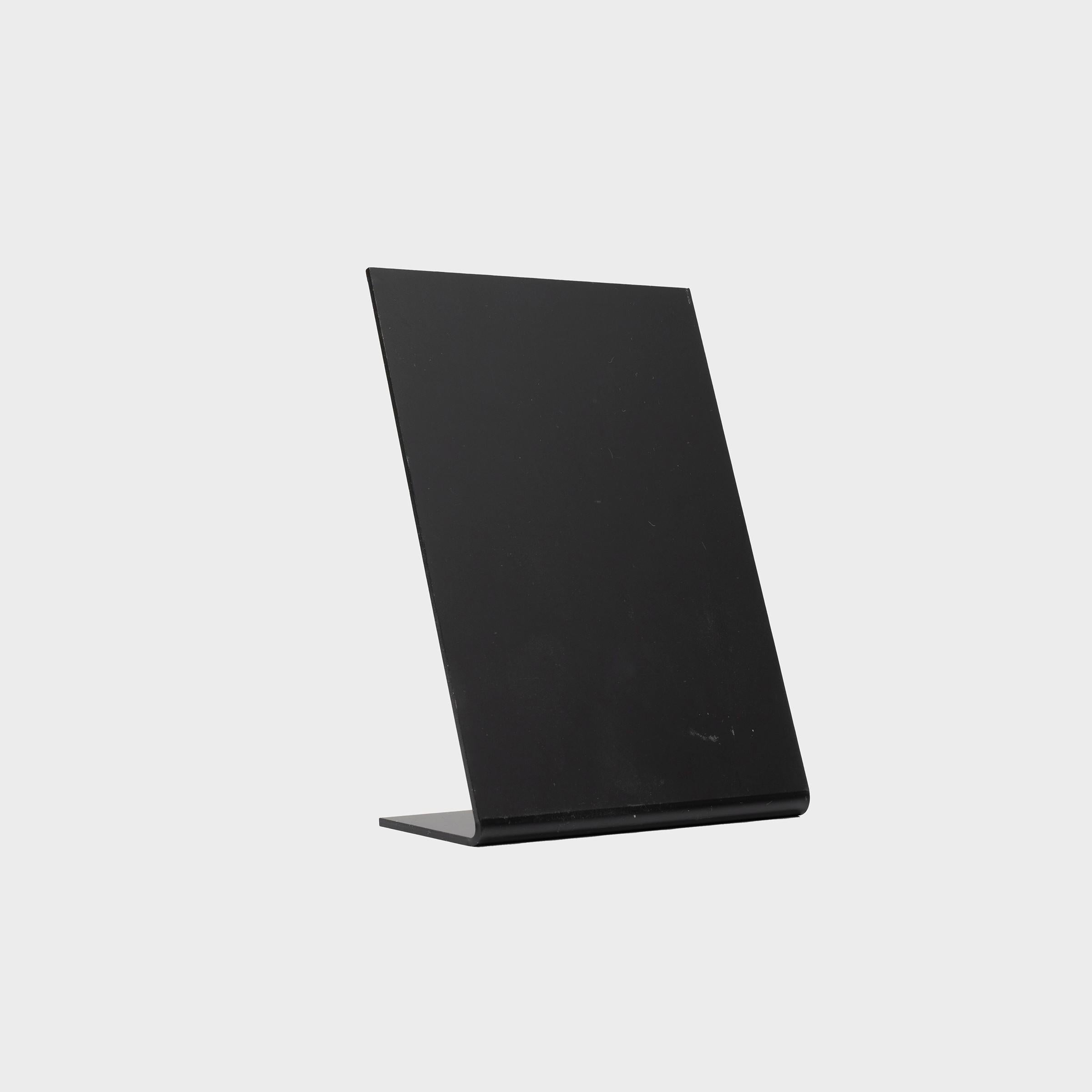 An L-shaped black chalkboard with a stand, designed for tabletop display.