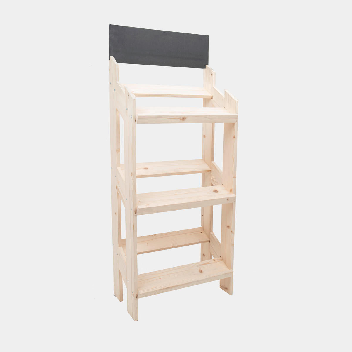 A flat-packed, unassembled wooden retail display stand with three shelves and a blackboard.