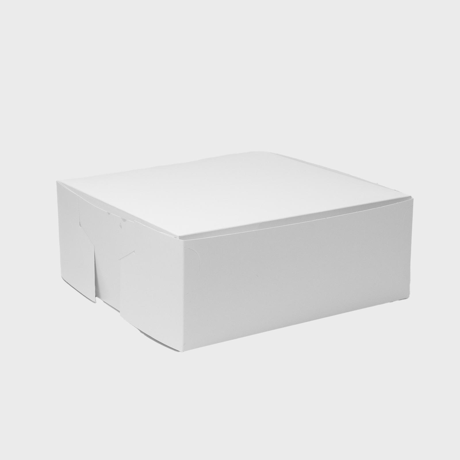 stacked white rectangular cardboard bakery boxes.