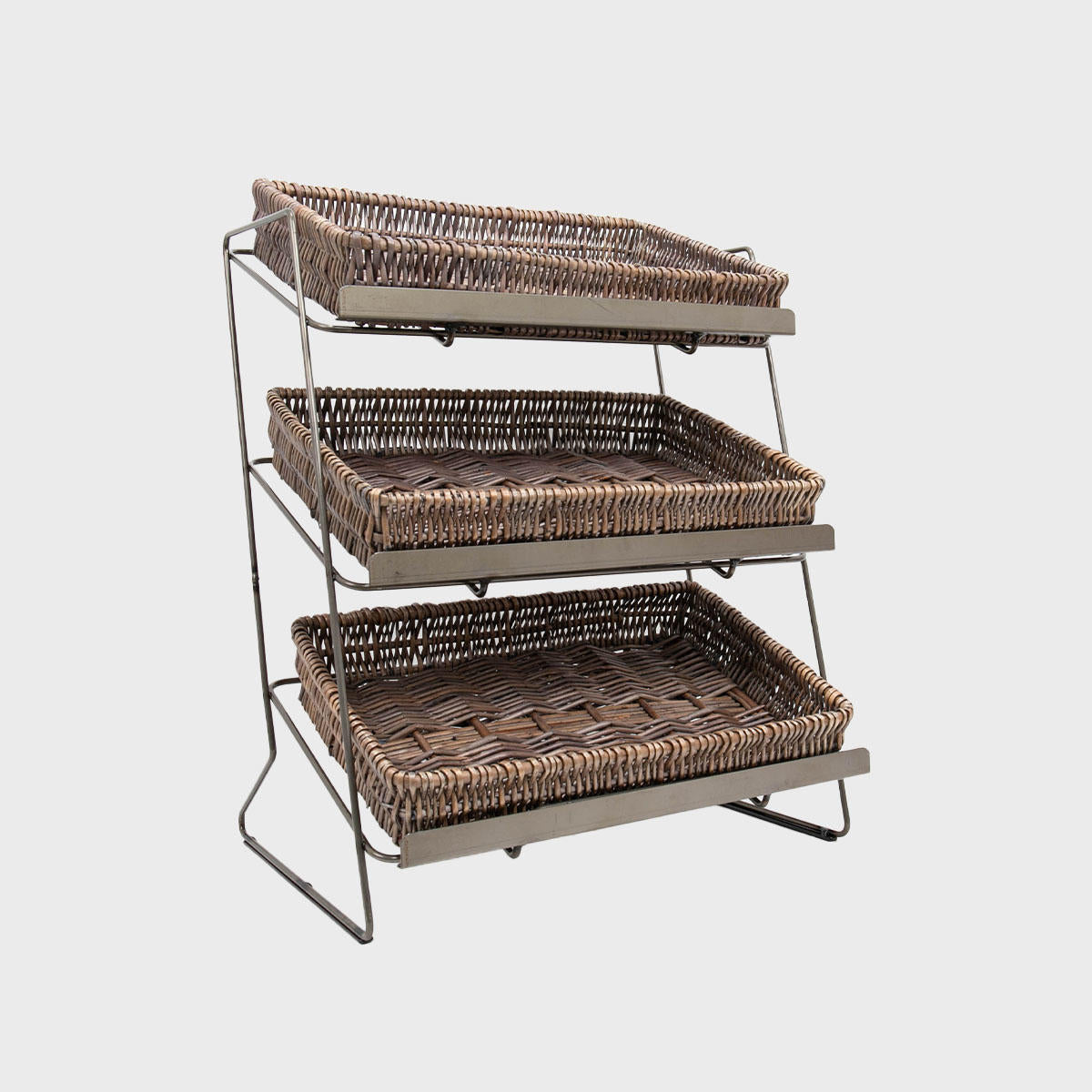 A tiered metal display unit with medium pewter wicker trays, designed for countertop use.