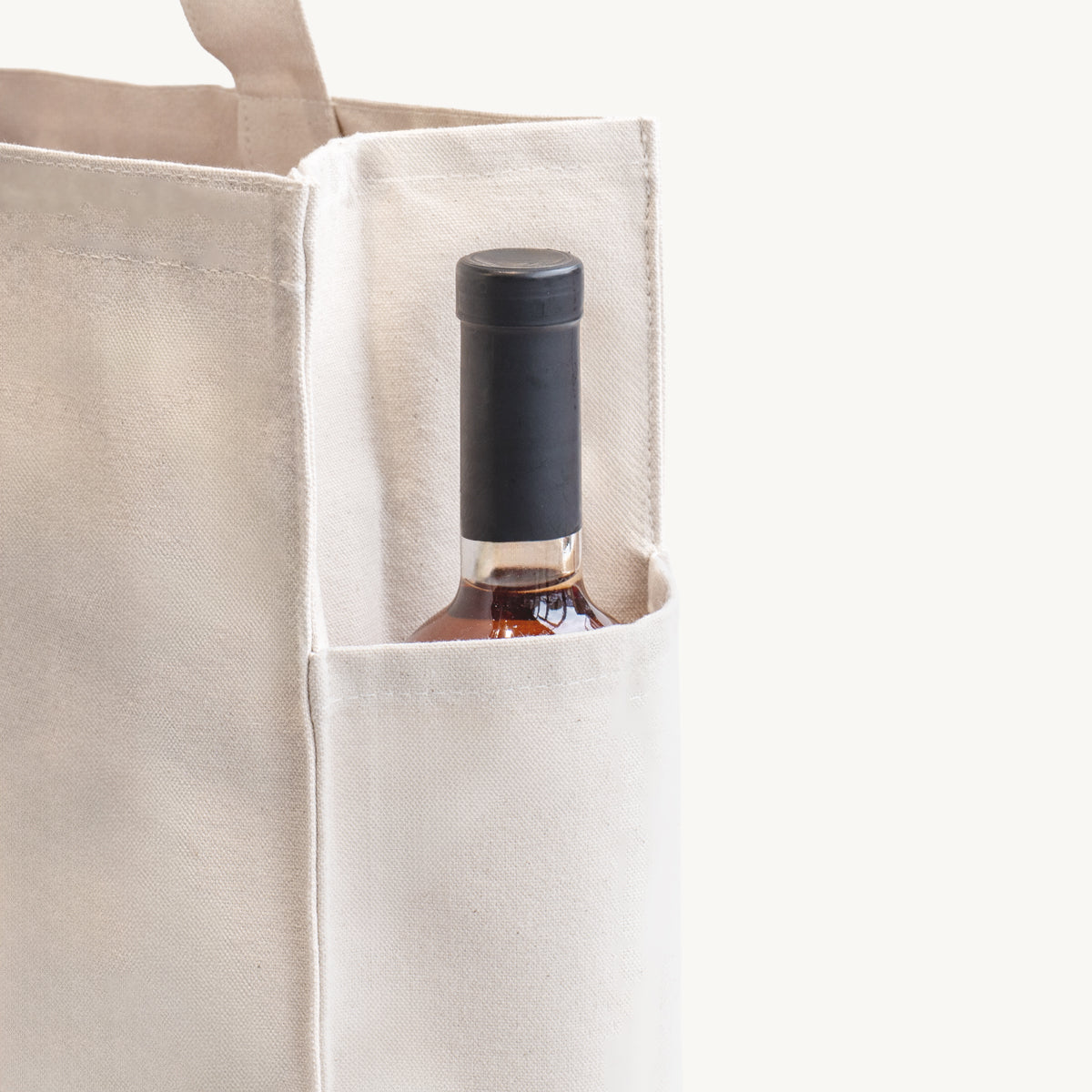 Large natural 12oz washed recycled canvas bag with side pocket professional clean structural profile finish.