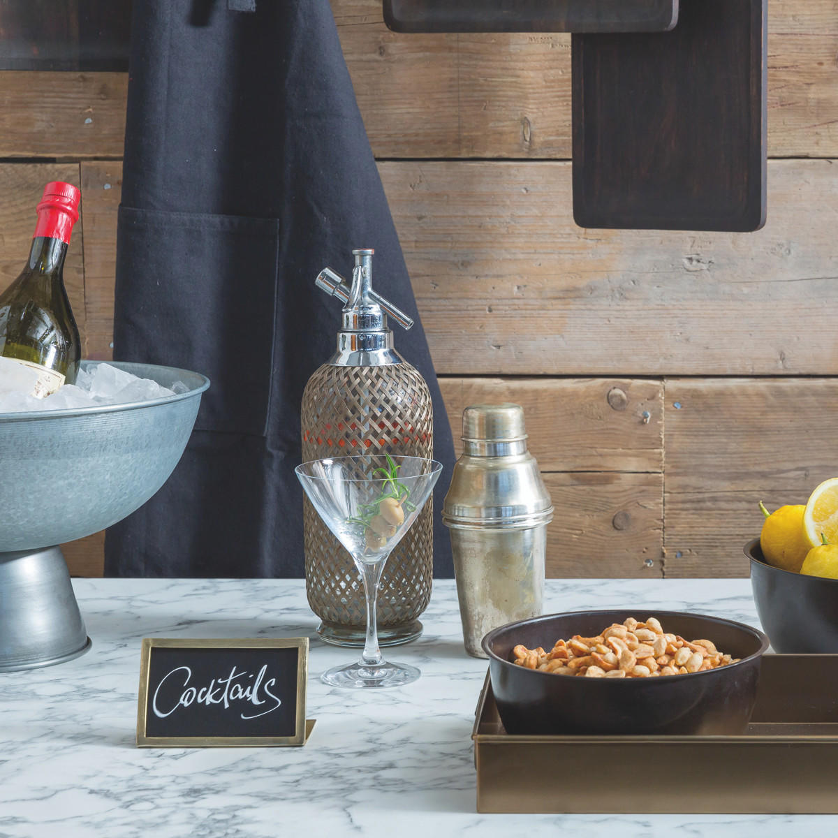 Railton brass metal tray with structured, low-profile walls and open-top design.