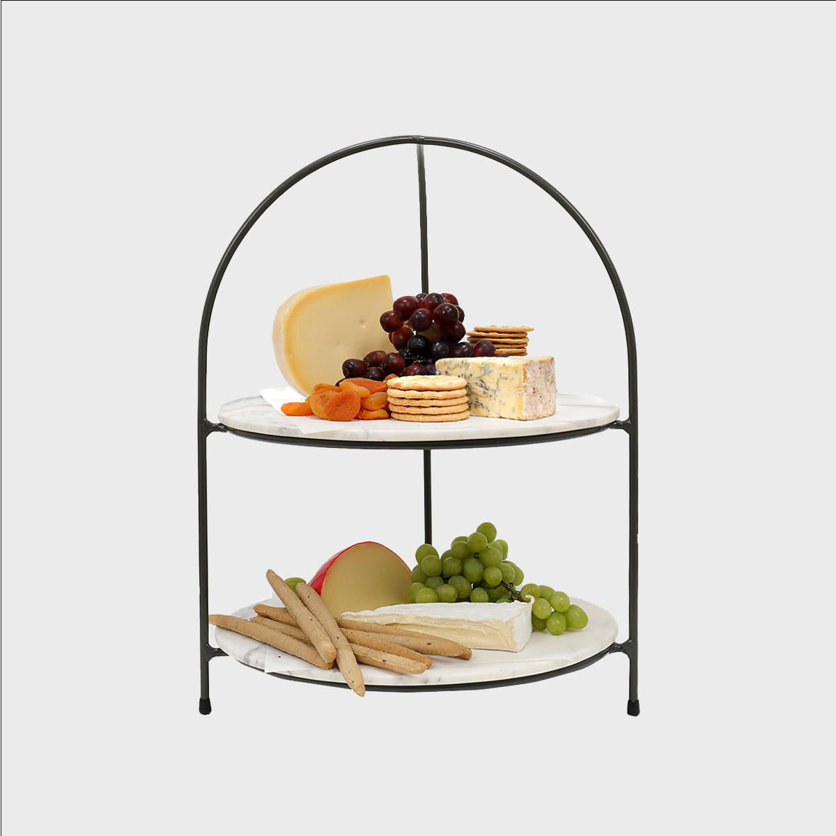 Leander metal tiered riser with light grey marble serving board with polished grey marble texture adding dimension.