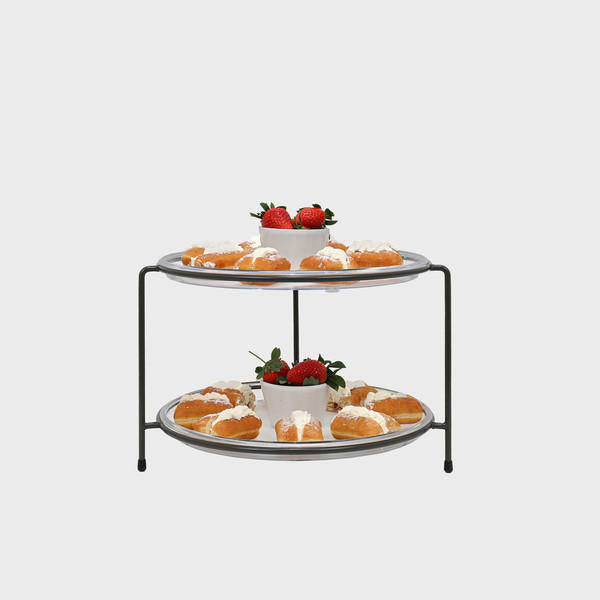 Leander metal tiered riser with handle and acrylic tray designed to add functional height and dimension.