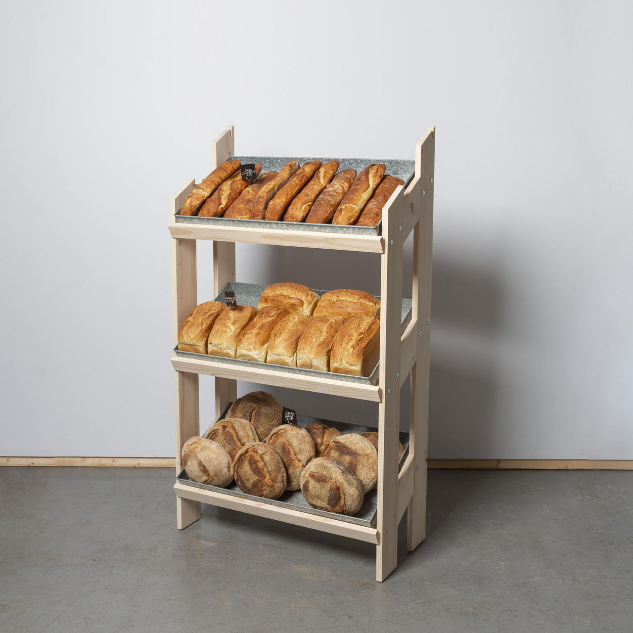 Norwood 3-shelf stand with galvanised trays and blackboard 820 with a clean surface for visible retail messaging.