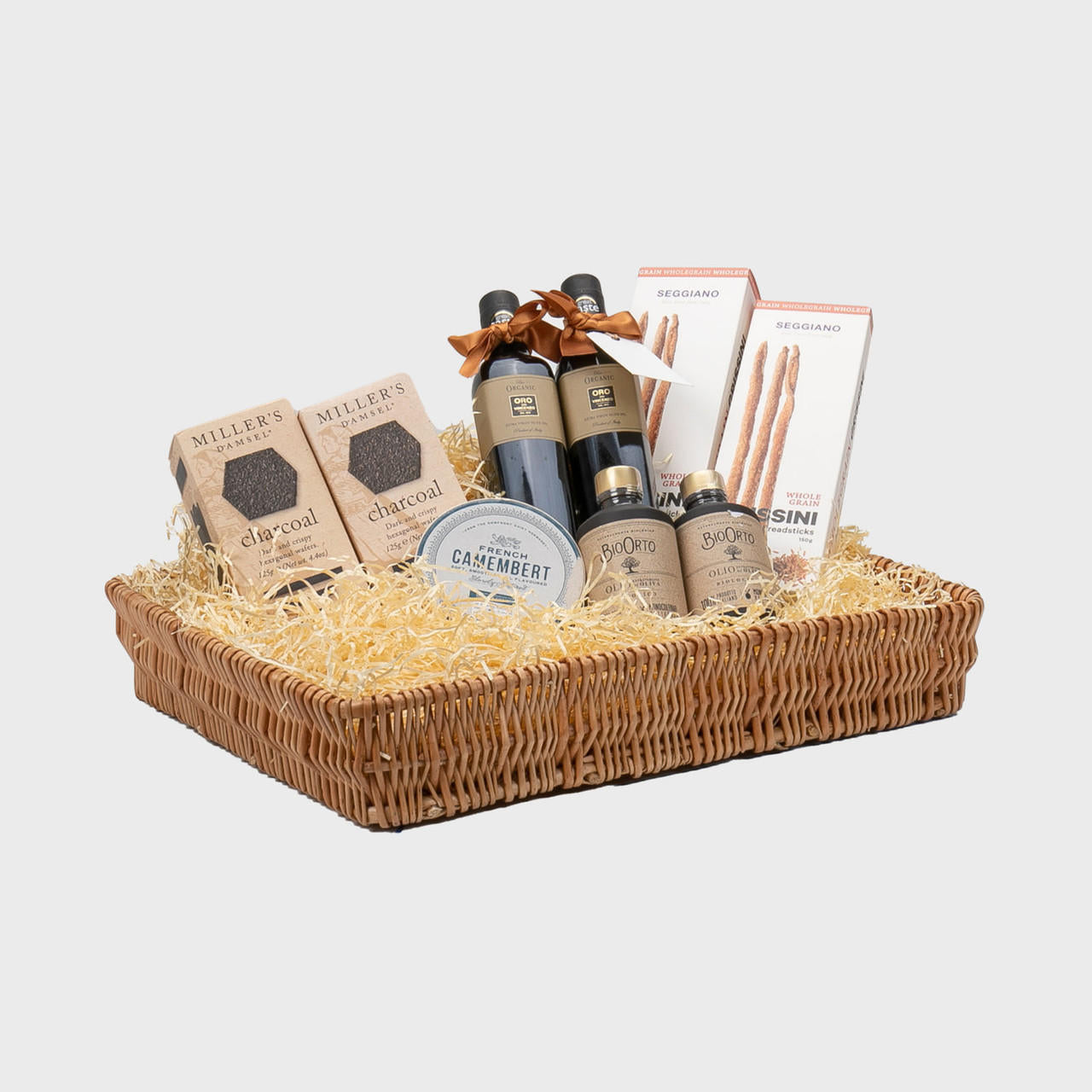 Medium shallow wicker tray with structured, low-profile walls and open-top design.