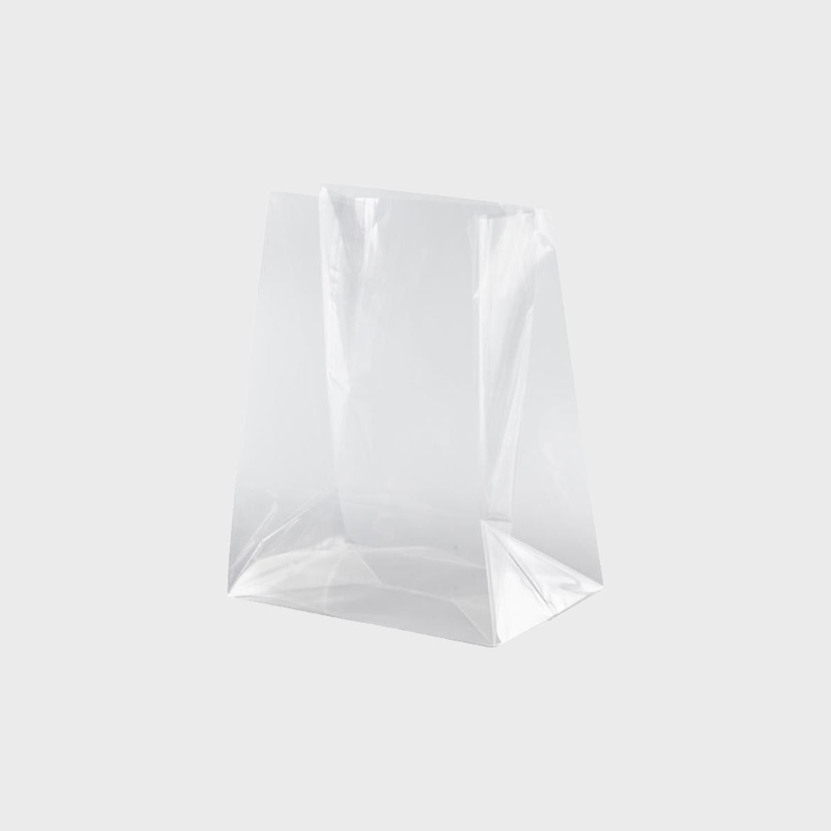 Cellophane gift bag featuring a patterned finish and heavy-duty handles.