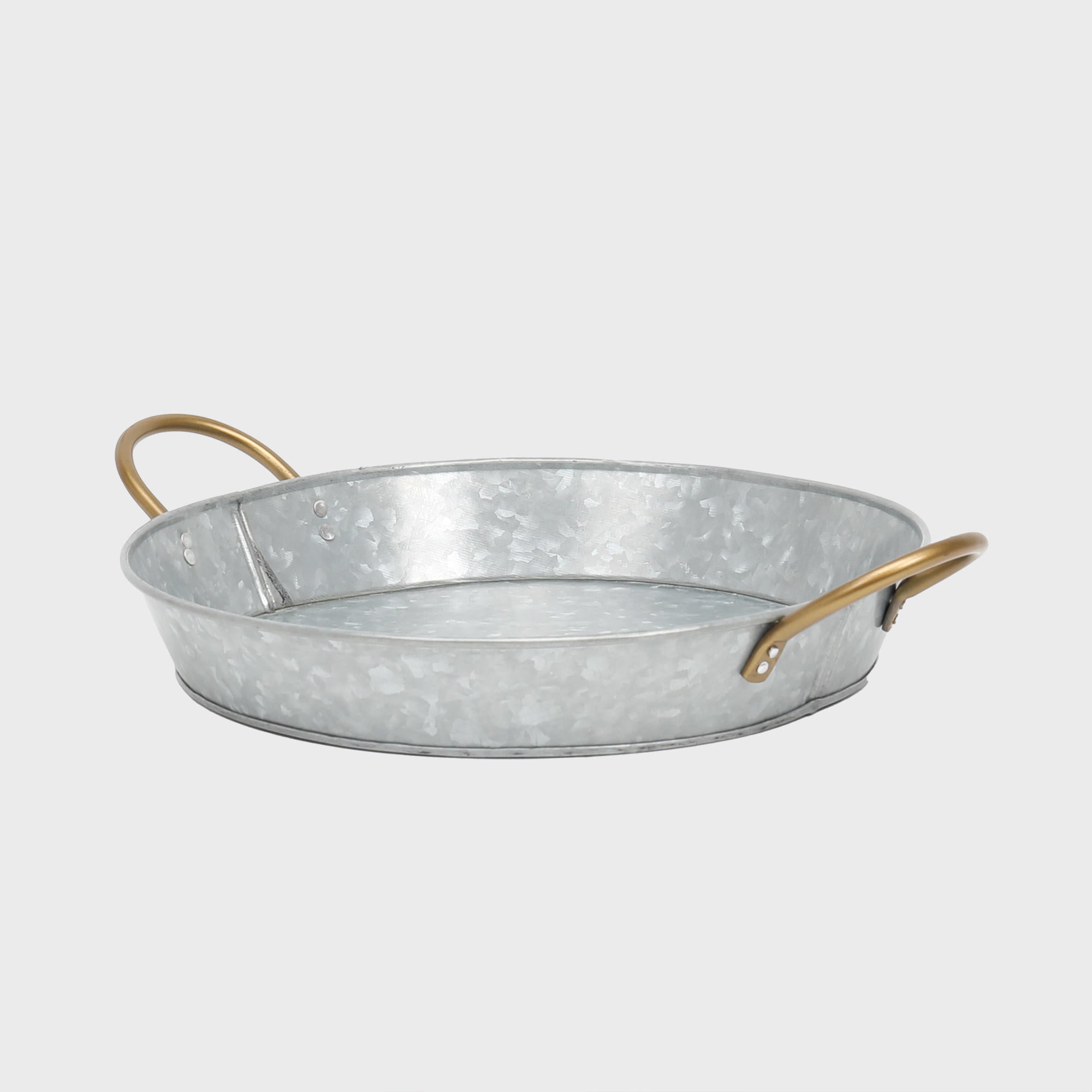Metal serving bowl with handles.