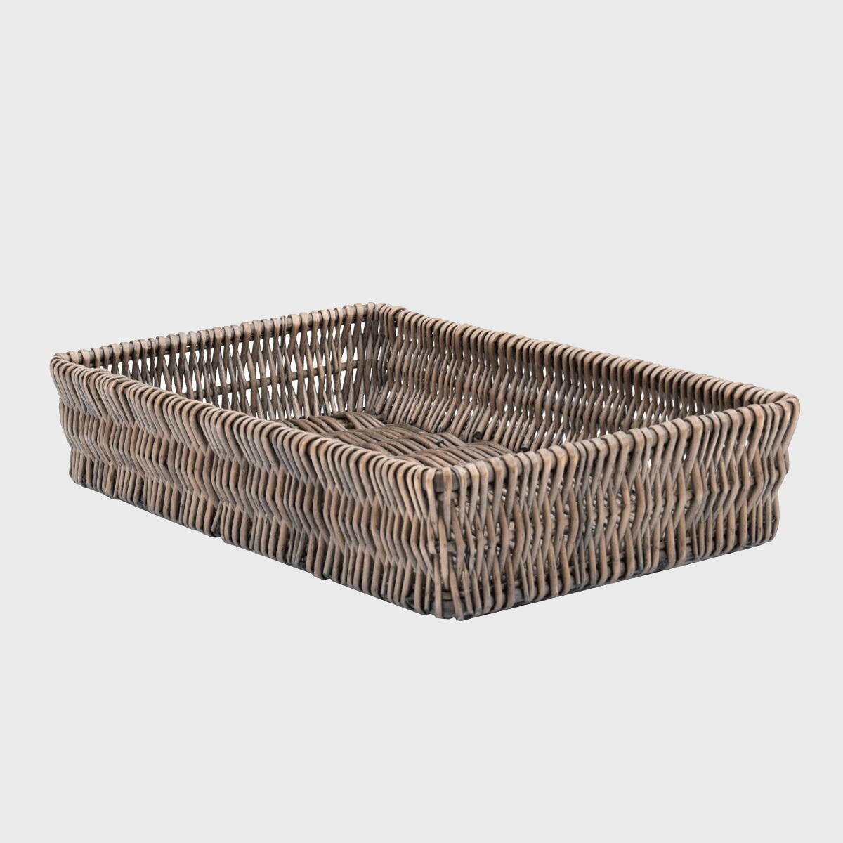 Shallow wicker basket hand-woven from natural split-wicker.