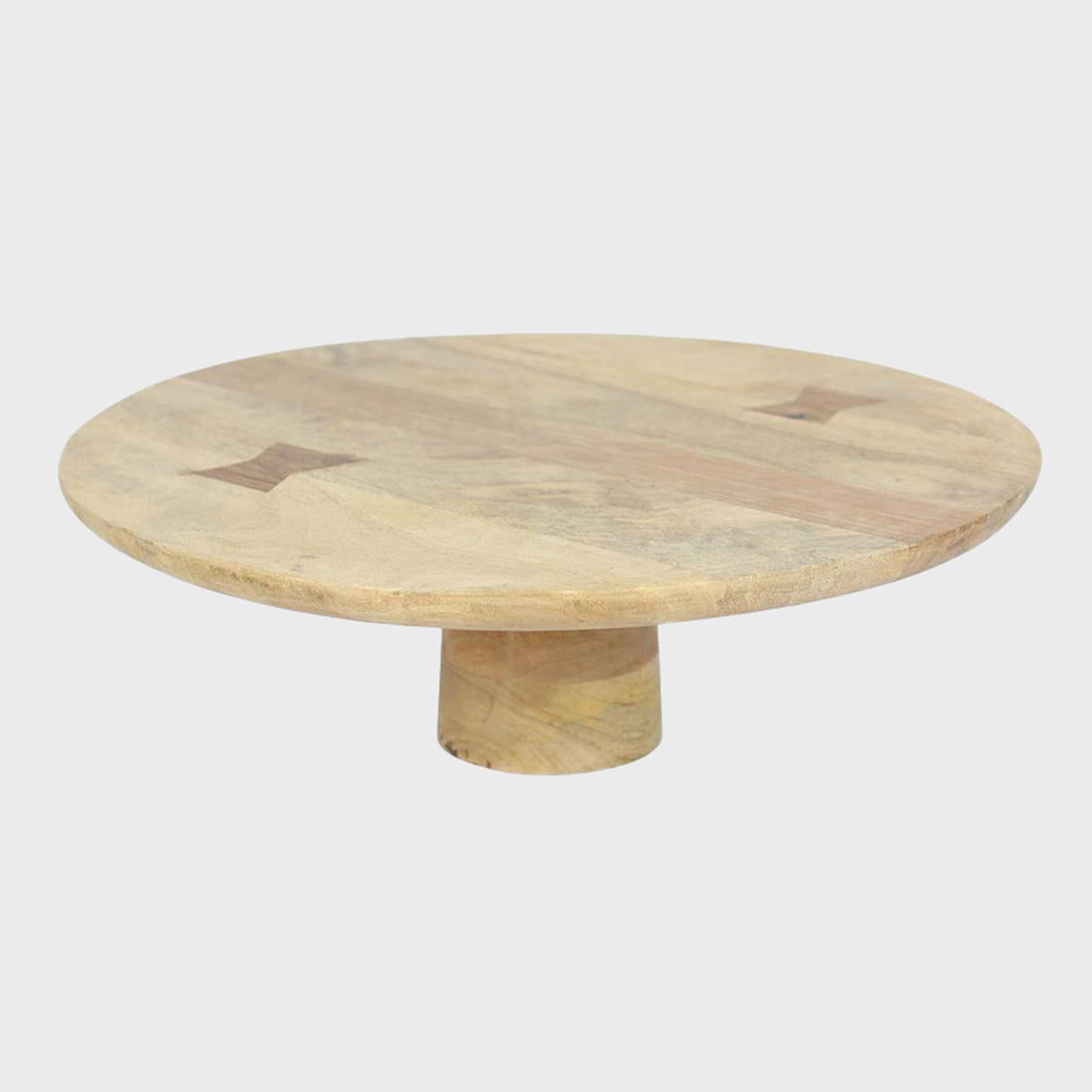 Mango wood wooden cake stand featuring a stable base and decorative scalloped edge.