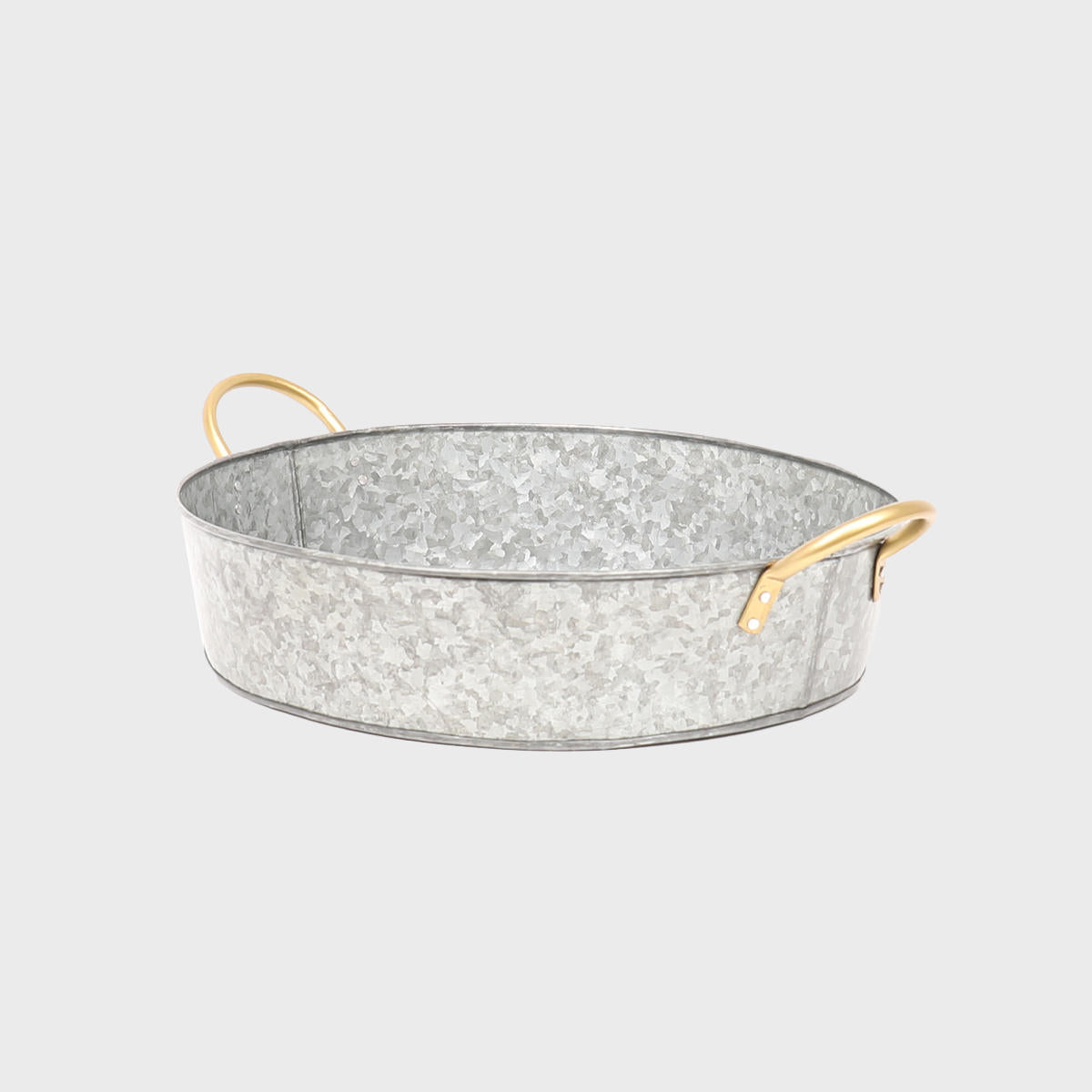 Metal serving bowl with handles.