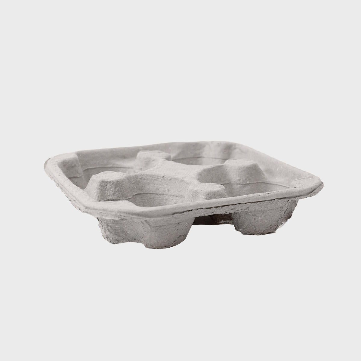 Pulp cup carrier tray with structured, low-profile walls and open-top design.