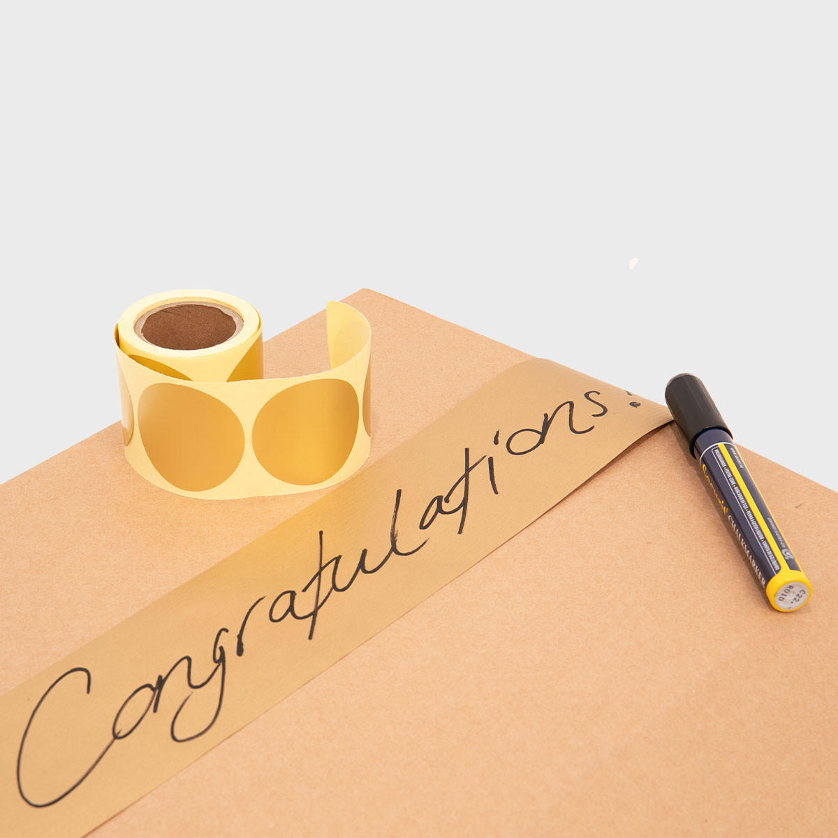 75mm Wide paper ribbon with a high-quality finish used as a decorative accent.