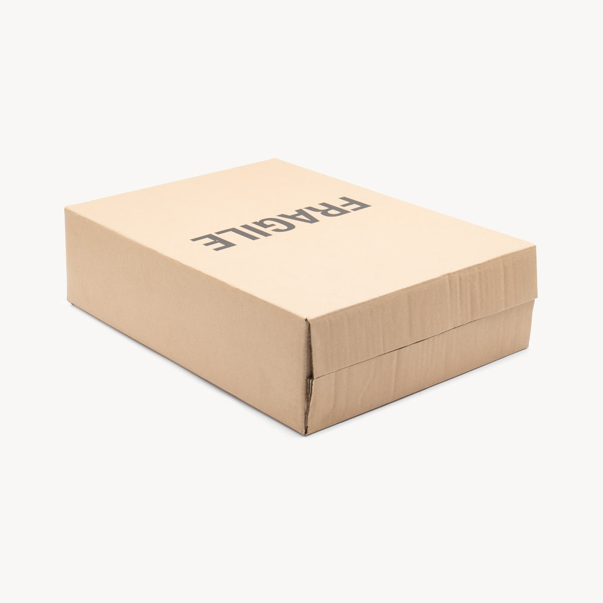 3 bottle carton protective outer made from robust corrugated cardboard for shock absorption.