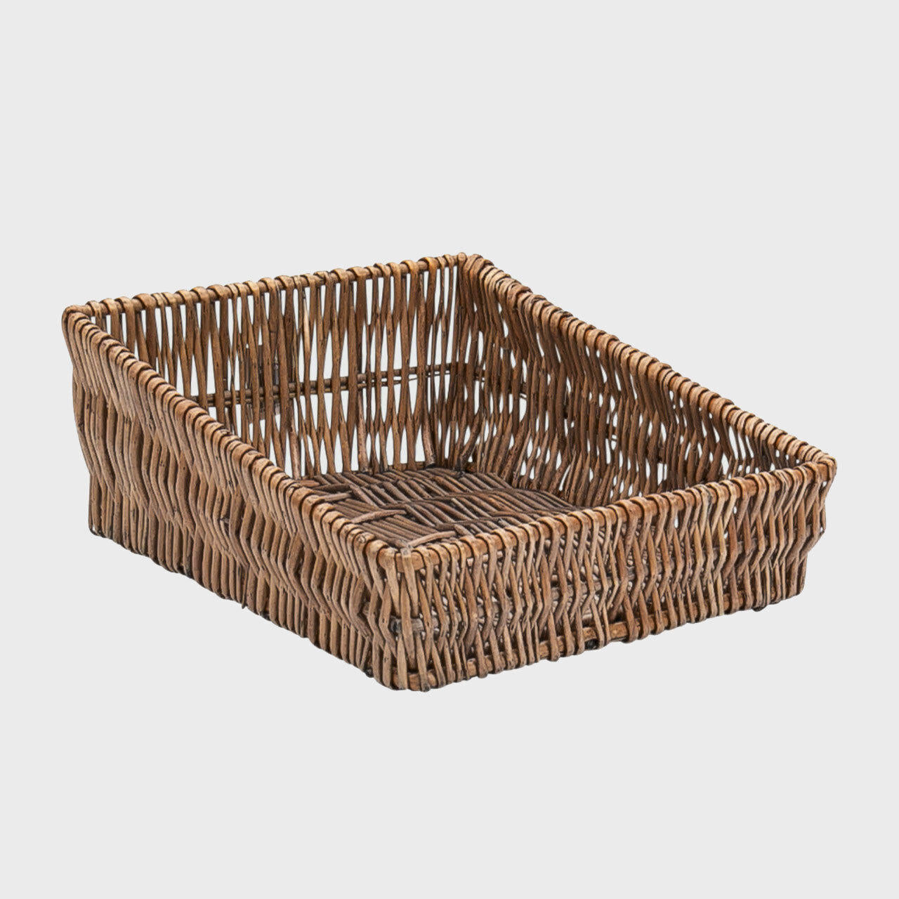 Medium shallow angled wicker basket hand-woven from natural split-wicker.