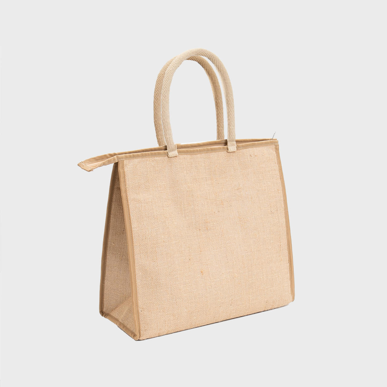 Large natural jute cooler bag with padded handles.