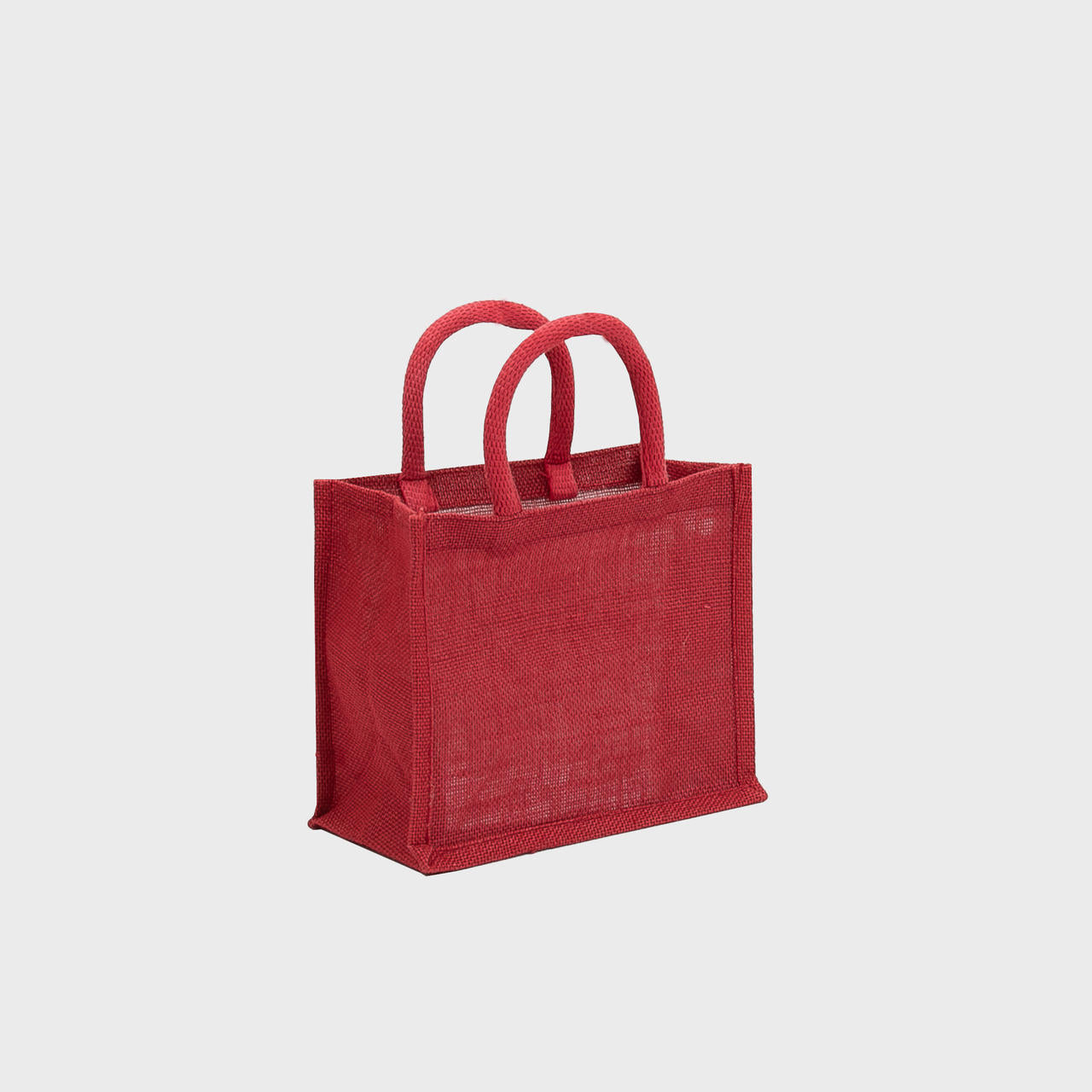 Mini red jute bag with padded handles.