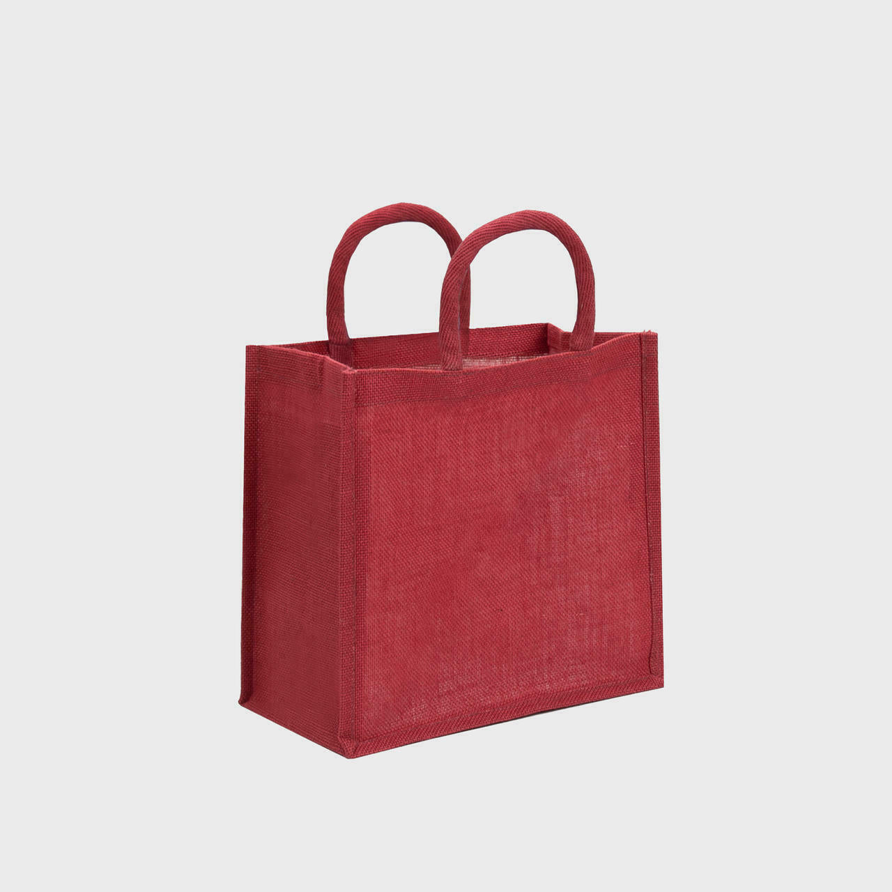Medium red jute bag with padded handles.