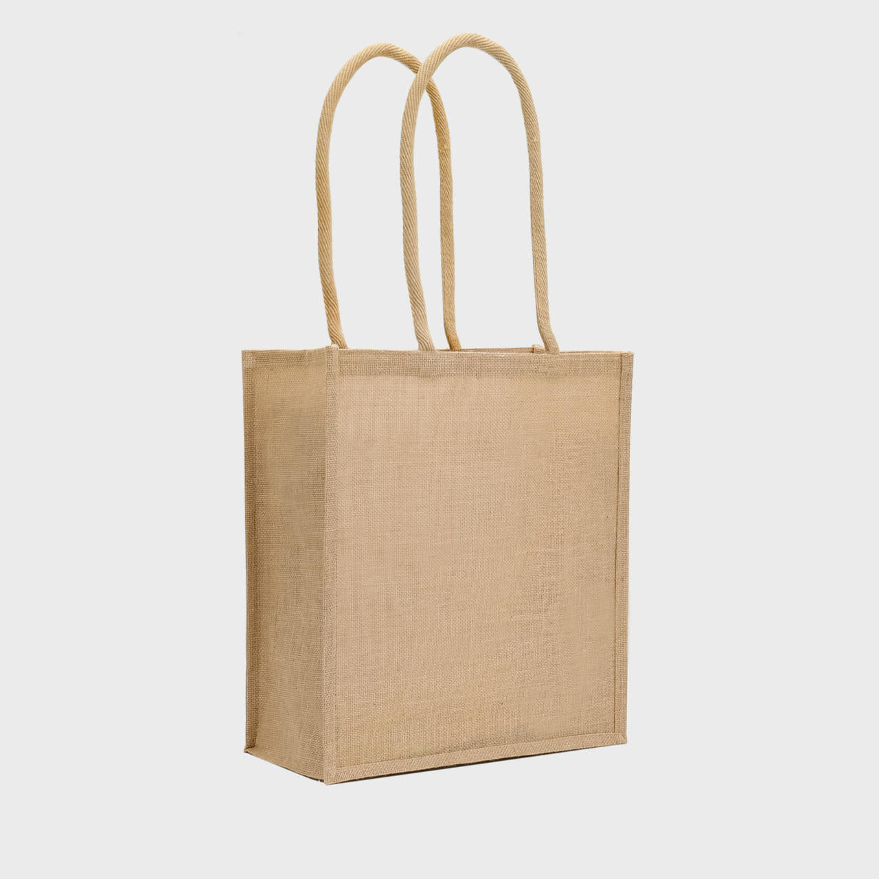 Large portrait jute bag with padded handles.