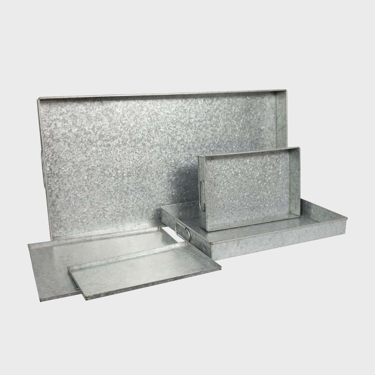 Metal trays nested set of 5 with structured, low-profile walls and open-top design.