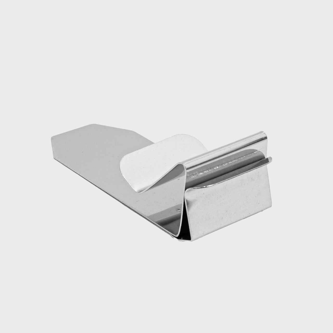 Metal shelf edge ticket holder with a clean surface for visible retail messaging.