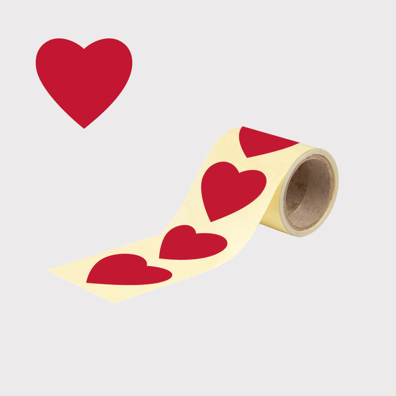 55mm red heart shape sticker (100 p/roll) with a high-quality finish used as a decorative accent.