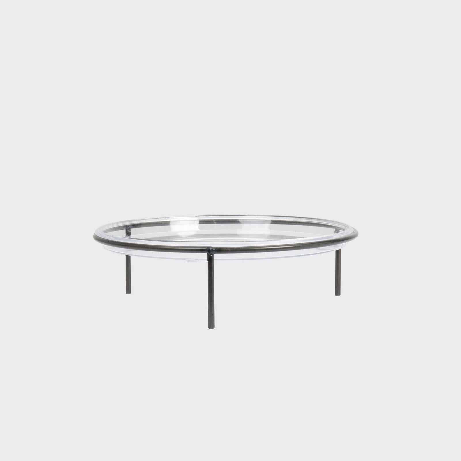 Matlock countertop stand with acrylic tray with structured, low-profile walls and open-top design.