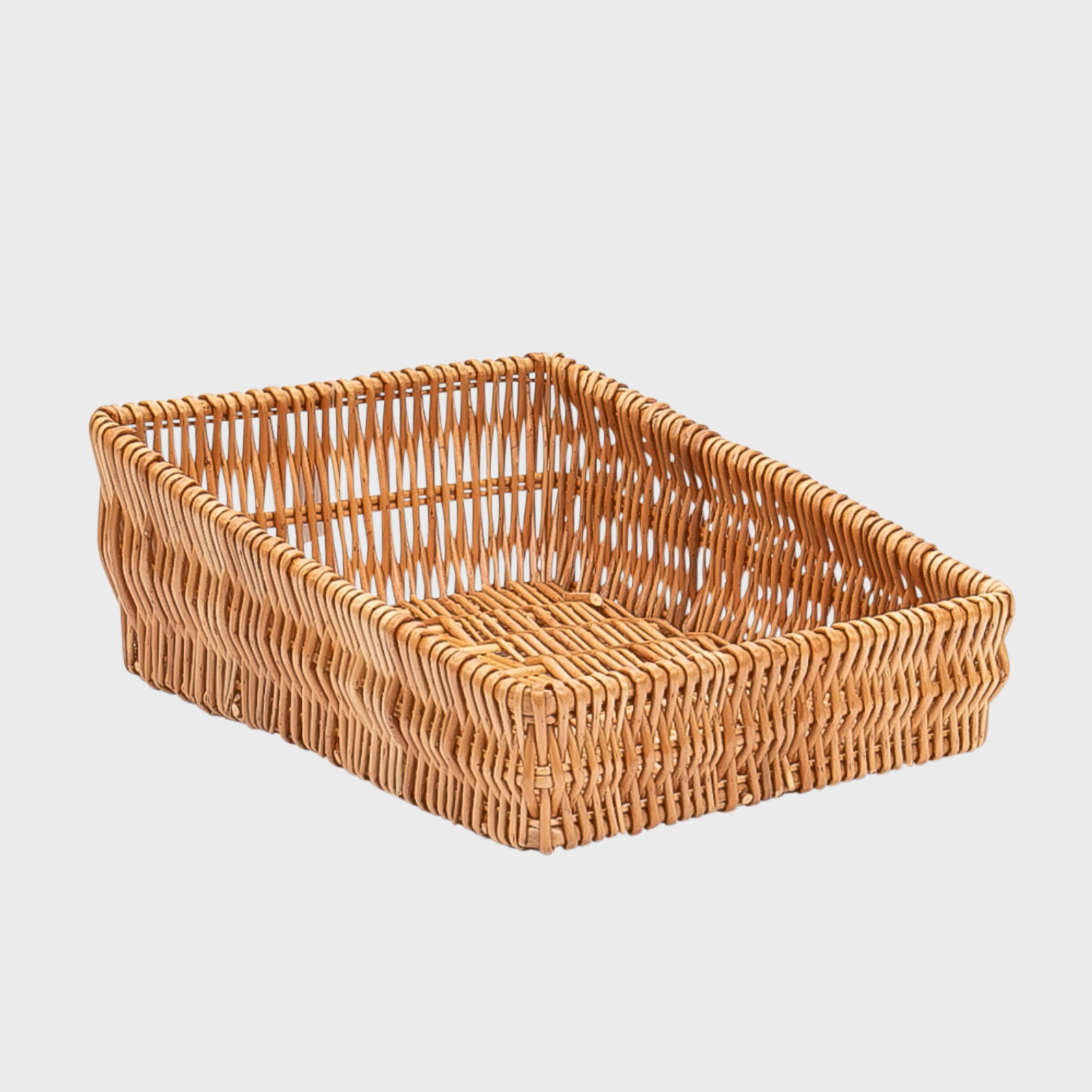 Medium shallow angled wicker basket hand-woven from natural split-wicker.