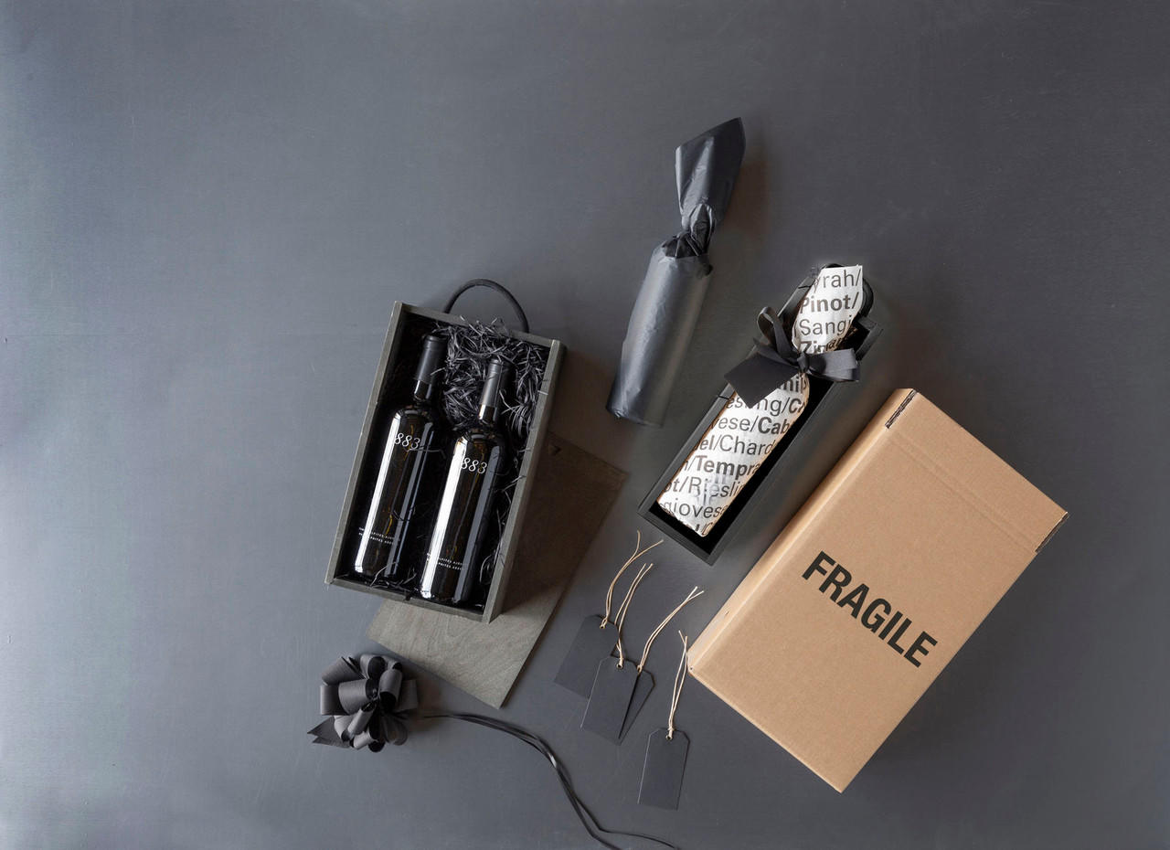 2 bottle black wooden box with sliding lid with premium natural wood grain and secure hardware closures.